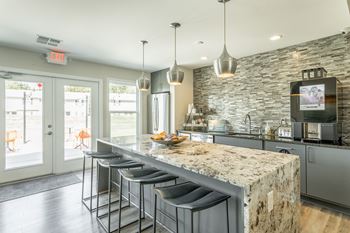 Clubhouse kitchen at hawthorne at lily flagg in huntsville, al